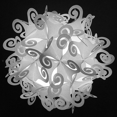 Vertex symmetry, directly over the meeting of two pentagons and two triangles. karen-smith-detail-1