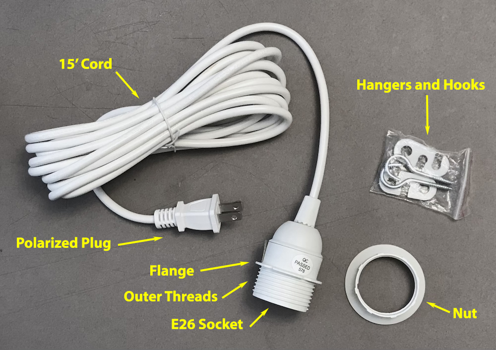 A typical Swag Kit consists of a 15' cord with a polarized, non-grounded plug end, an E26 socket end (medium base), a flanged nut for attaching to the shade, and hangers/hooks for attaching to the ceiling. Some also have switches on the cord. Swag%20Kit