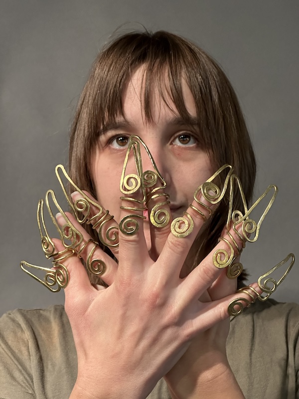 Ten rings made of brass wire, by Anna Leigh Bodo, Fall 2023. anna-leigh-bodo-2